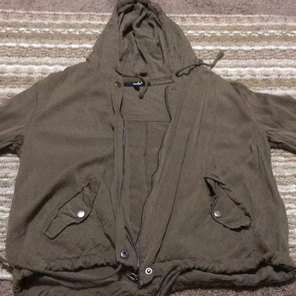 Green jacket, light for cooler days